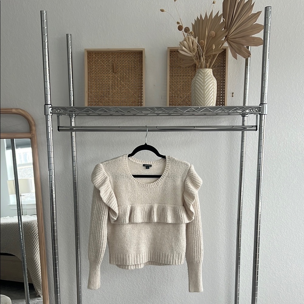 Elegant Cream Sweater with Ruffle Detail